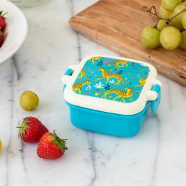 Turquoise plastic snack pot with cream and turquoise lid featuring print of cheetahs