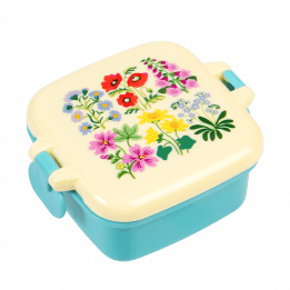 Turquoise snack pot with cream lid featuring wild flower pattern