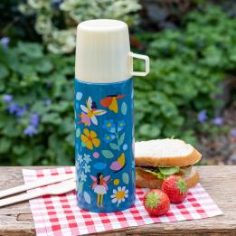 Small dark blue stainless steel flask with cream plastic cup featuring fairies amongst flowers