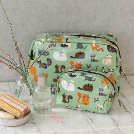 Light green oilcloth wash bag and makeup bag collection with illustrations of cats