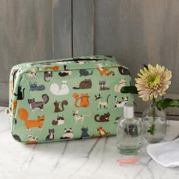 Light green oilcloth wash bag with illustrations of cats