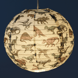 Paper lampshade with illustrations of dinosaurs hung with light on shining through