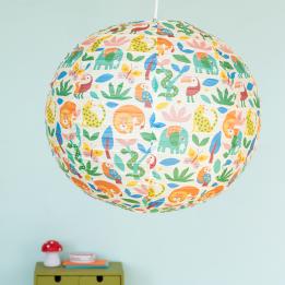 White paper lampshade with colourful wild animal decoration installed in room