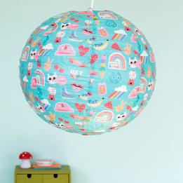 Light blue paper lampshade with retro style top banana decoration installed in room