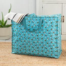 Turquoise jumbo storage bag with print of bumblebees