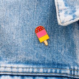 Ice lolly pin badge attached to piece of clothing