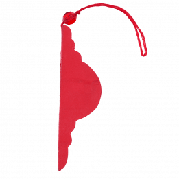 Honeycomb paper Christmas decoration in red folded flat