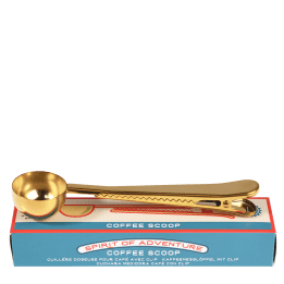 Spirit of Adventure coffee scoop with bag clip on top of box