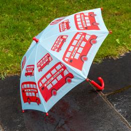 A children’s umbrella featuring red double-decker buses.