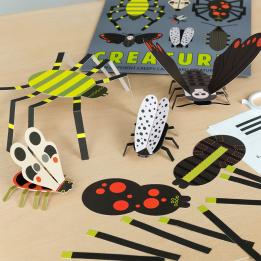 Colourful paper-crafted insects model lifestyle