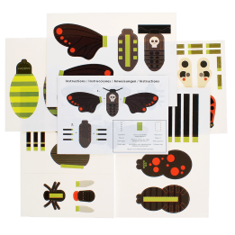 paper craft kit with cut-out pieces and instruction sheet