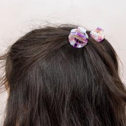 Mini hair claw clips for children, Featuring detailed seashell designs.