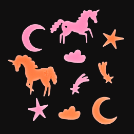 Assorted glow-in-the-dark unicorn featuring stars, moons, and clouds on a black background