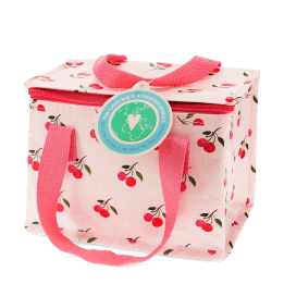 Insulated lunch bag decorated with cherry pattern on a light pink background and featuring a tag