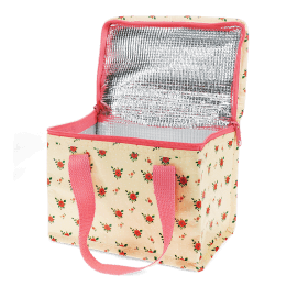 Insulated lunch bag decorated with a floral pattern and a zip opening