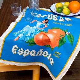 Cotton tea towel featuring a stylized "Cerveza Española" design, with an illustration of a woman in traditional Spanish dress