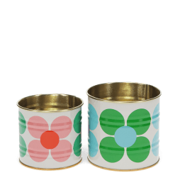 Two floral storage tins, one small with pink daisy and one large with green and blue daisy print