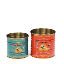 Two storage tins, one small and one large, featuring bees, flowers, and beehive illustrations.