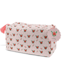 Rectangular makeup bag in pale pink with a floral pattern of small red and green flowers with tag