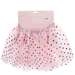 Pink skirt with colourful polka dots in multilingual instructions packaging