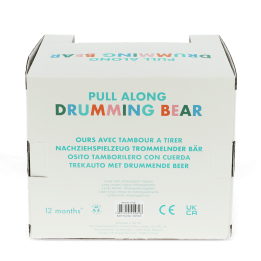 Wooden pull-along toy packaging with safety instructions