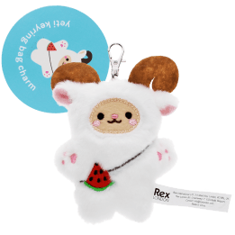 Yeti-shaped plush keyring with pink ears and paws, a watermelon accessory with metal clasp and a tag