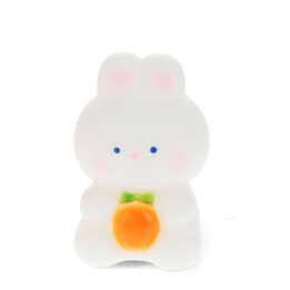 White bunny night light with an orange carrot