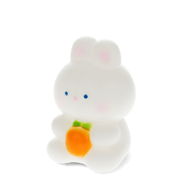 White bunny night light with an orange carrot