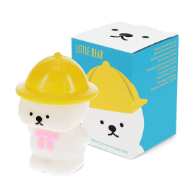 White bear night light wearing a yellow hat, shown next to its yellow packaging box