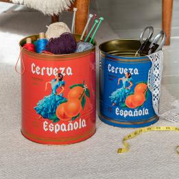 Two large Cerveza Española tins used for storing craft supplies.