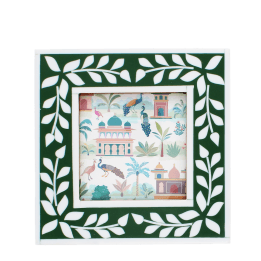 Square green picture frame with white leaf patterns on the border.