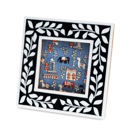 Square picture frame with white leaf patterns and navy blue colour on the border.