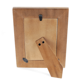 back view of a picture frame with black metal clips and a stand
