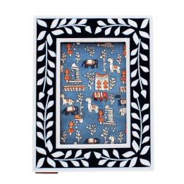 picture frame with a navy blue border and white leaf patterns