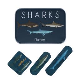 Sharks-printed plasters placed beside a matching storage tin featuring sharks illustrations
