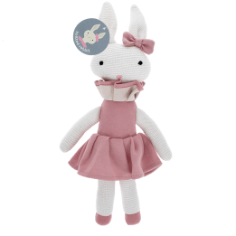Knitted rabbit toy with long ears, wearing a pink dress with a ruffled collar and a matching bow on one ear with tag