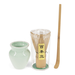 Matcha whisk set with bamboo whisk in container, ceramic holder, and bamboo scoop