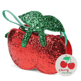 Children’s glitter handbag shaped like a red cherry, with green leaves and a green strap with tag