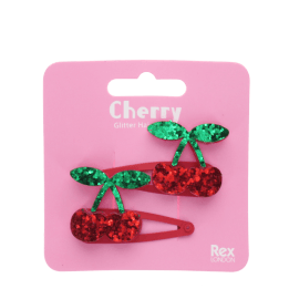 Pair of red glitter cherry hair clips with green glitter leaves in packaging
