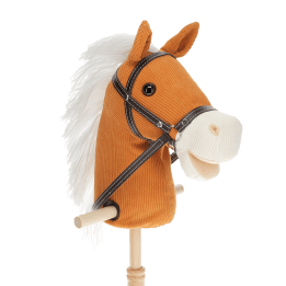 hobby horse toy with white mane and black bridle on a wooden stick