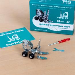 Completed forklift truck model displayed with its packaging box