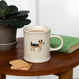 Stoneware mug featuring a dog with handle 