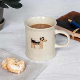 Stoneware mug featuring a dog with handle 