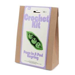 Crochet kit front packaging with printed peas in a pod design 