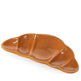Brown ceramic trinket dish shaped like a croissant.