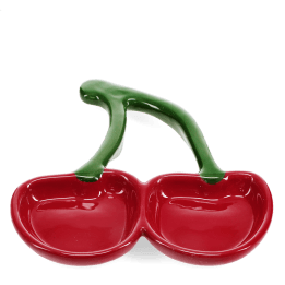 Red ceramic trinket dish shaped like two cherries with green stems.