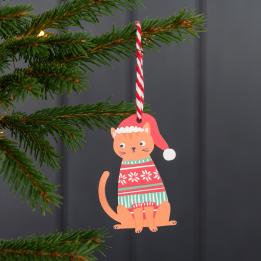 Wooden Christmas decoration of ginger cat wearing festive jumper and hat hanging on tree