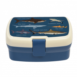 Dark blue lunch box with cream and dark blue lid featuring images of sharks