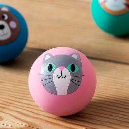 Pink bouncy ball with a cat face design