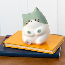 Green and white squidgy stress cat in a sitting design